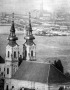 A Batthyáhy-téri templom a Halászbástyáról távcső-lencsével fölvéve A Batthyáhy-téri templom a Halászbástyáról távcső-lencsével fölvéve